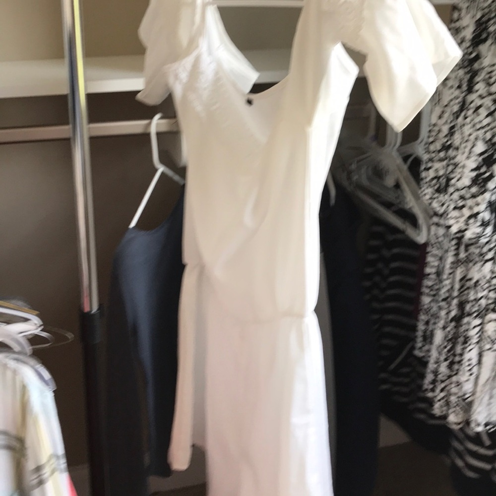 Off the shoulder white romper with lace detail